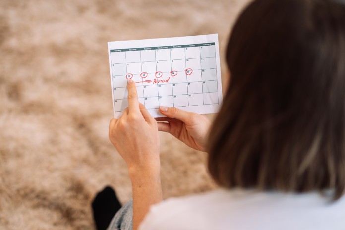 Ženska in koledarček menstrualni